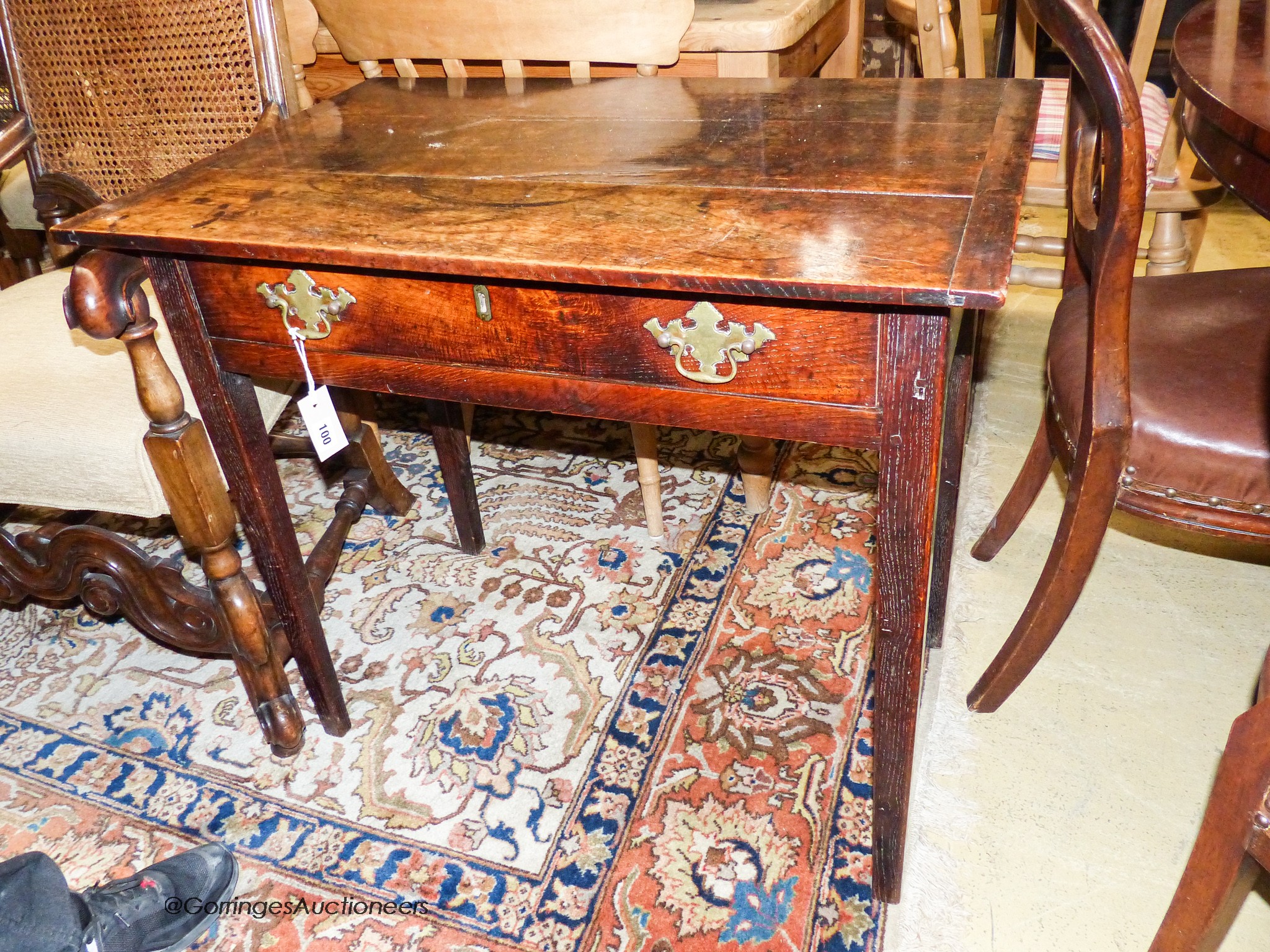 A George III rectangular oak side table fitted frieze drawer, width 83cm, depth 55cm, height 73cm